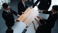 Top view of businesspeople putting jigsaw together at meeting room. Directorate. Royalty Free Stock Photo