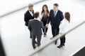 Top view of business people shaking hands, finishing up a meeting - Welcome to business. Royalty Free Stock Photo