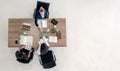 Top view of business people shaking hands after sealing a deal. High angle view of casual businesswomen handshake Royalty Free Stock Photo