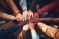 Top view of business people stacking hands together. Multiethnic group of people standing together in circle. Teamwork concept, Royalty Free Stock Photo