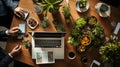 Top view of business people working with mobile phone and laptop at office desk Royalty Free Stock Photo