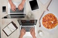 Top view of business people working at office desk and having a Royalty Free Stock Photo