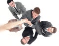 Top view .the business team helps the leader to rise up.