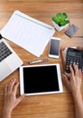 Top view business woman use tablet mockup laptop and calculator with office stationery Royalty Free Stock Photo