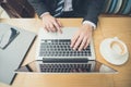 Businessman hands typing on laptop computer keyboard Royalty Free Stock Photo