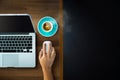 Top view of a businessman using his work computer on a desk Royalty Free Stock Photo