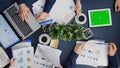 Top view of businesswoman looking at mock up green screen chroma key tablet Royalty Free Stock Photo