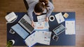 Top view of businesswoman sitting at desk table checking financial accounting documents Royalty Free Stock Photo