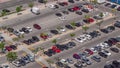 Top view busy parking lot with many cars moving in and out timelapse. Royalty Free Stock Photo