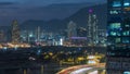 Top view of busy traffic night in finance urban timelapse, hong kong city Royalty Free Stock Photo