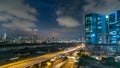 Top view of busy traffic night in finance urban timelapse, hong kong city Royalty Free Stock Photo