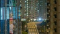 Top view of busy traffic night in finance urban timelapse, hong kong city Royalty Free Stock Photo