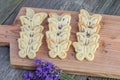 Top View on Butter biscuits cookies with lavender on an oak chop Royalty Free Stock Photo