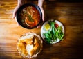 Top view of Cambodian cuisine, stewed beef with baguette.