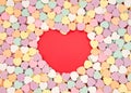 top view of candy hearts with red hart forming in center Royalty Free Stock Photo