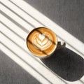 Top view of cappuccino in window Shadow background Royalty Free Stock Photo