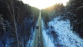 Top view of the car riding in the woods. Footage. The car goes on a winter road in the woods Royalty Free Stock Photo