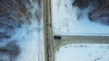 Top view of the car riding in the woods. Footage. The car goes on a winter road in the woods Royalty Free Stock Photo