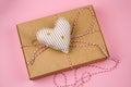 Cardboard box with cute stripped toy heart