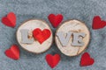 top view cardboard letters LOVE and paper hearts