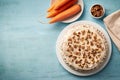 Top view carrot cake on a blue wooden background wooden background