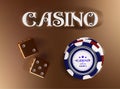 Top view of Casino sign poker chips, dice on golden background. Online casino wide banner with black and white chip game Royalty Free Stock Photo