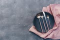 Top view of ceramic plates on linen and rustic silverware Royalty Free Stock Photo