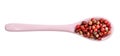 Top view of ceramic spoon with pink peppercorns Royalty Free Stock Photo