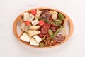 Top view on cheese and meat snacks platter. Traditional Italian antipasti board with variety of cheeses, sausages Royalty Free Stock Photo