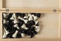 Top view of chess set in the wooden box.White and black figures of chess