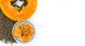 Top view Chia Pudding with Fresh Papaya in jar on white background. Clean eating concept, healthy vegetarian food. Ingredients