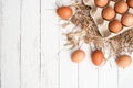 Top view chicken egg on carton box and egg yolk