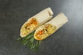 Chicken meat shawarma served with rosemary on dark background Royalty Free Stock Photo