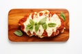 Top View, Chicken Parmesan On A Wooden Boardon White Background