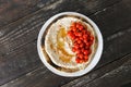 Top view Chickpea hummus served flatbread cherry tomatoes wooden