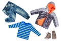 Top view on child boy set of clothes. Collage of apparel clothing. Jeans , shirt, shoes and warm down jacket isolated on a white Royalty Free Stock Photo
