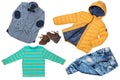 Top view on child boy set of clothes. Collage of apparel clothing. Jeans , shirt, shoes and warm down jacket isolated on a white Royalty Free Stock Photo