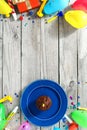 Top view children birthday table Frame chocolate muffin sparkler
