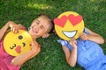 Top view of children with various loving emoticons in their hands on Emoji Day Royalty Free Stock Photo