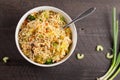 Top view of chinese chicken lo mein on dark wooden background