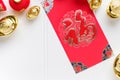 Top view Chinese New year red envelope packet ang pow with gol