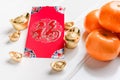 Top view Chinese New year red envelope packet ang pow with g Royalty Free Stock Photo