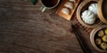 Top view of Chinese steamed dumpling and steamed pork bun in a bamboo steamer Royalty Free Stock Photo