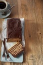 Top view of chocolate cake on wooden table