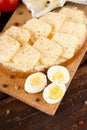 Top view on chopping board with quail eggs and bread Royalty Free Stock Photo