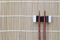 Top view chopsticks on bamboo mat