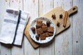 Top view of Christmas cookies on wooden chopping board Royalty Free Stock Photo