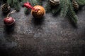 Top of view christmas decorations jingle bells fir tree pine cones on free concrete background Royalty Free Stock Photo