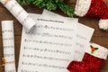 Top view Christmas music note paper with Christmas decoration o Royalty Free Stock Photo