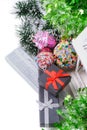 Top view on christmas present boxes and tinsel Royalty Free Stock Photo